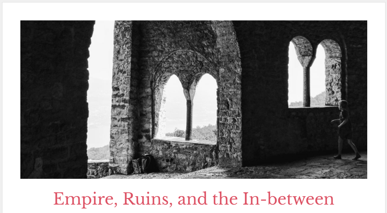 Black and White photo of ruins is the header slide