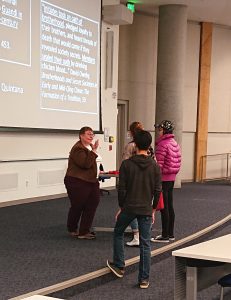 Professor O'Toole and students in lecture hall